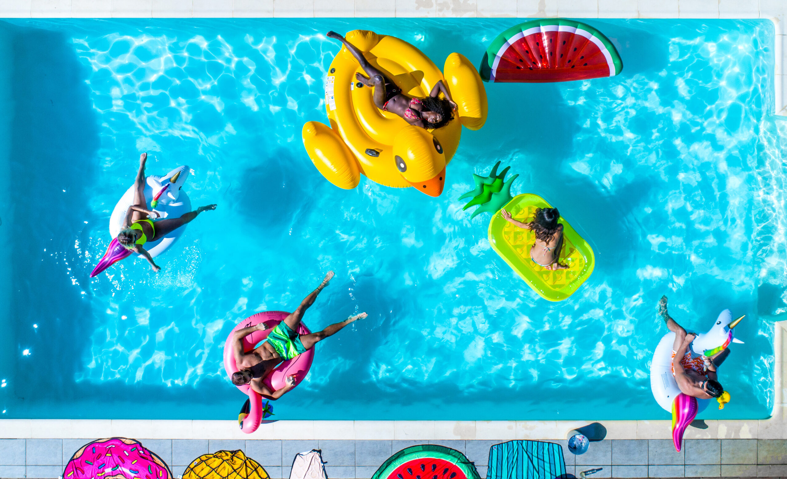 Friends having fun in a swimming pool